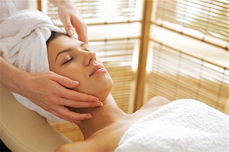 simsearch:851-02963682,k - Young woman receiving massage, eyes closed Stock Photo - Premium Royalty-Free, Code: 693-08127490