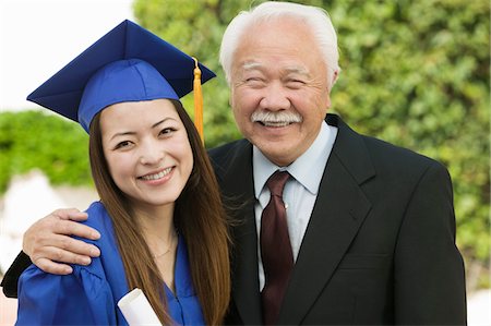 people successful college graduate with family - Graduate and Grandfather outside, portrait Stock Photo - Premium Royalty-Free, Code: 693-03299531
