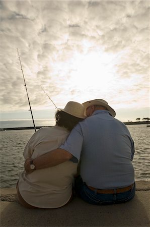 Senior couple fishing at ocean Stock Photo - Premium Royalty-Free, Code: 693-03299736