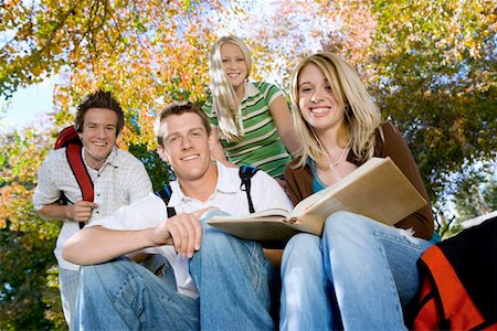Students studying outdoors, (portrait) Stock Photo - Premium Royalty-Free, Code: 693-03299783