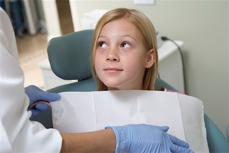 Girl (7-10) at dentists, (close-up) Stock Photo - Premium Royalty-Free, Code: 693-03299819