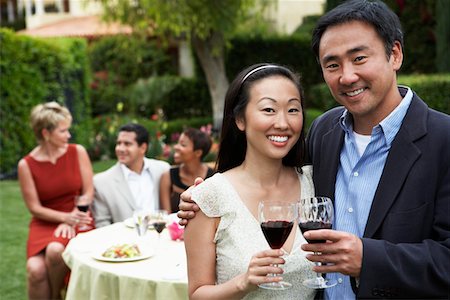 simsearch:694-03318761,k - Couple drinking wine at garden party Stock Photo - Premium Royalty-Free, Code: 693-03299926
