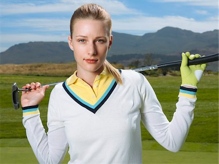 simsearch:693-03304456,k - Young female golfer holding club, portrait Foto de stock - Sin royalties Premium, Código: 693-03304431