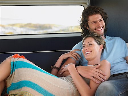 Young couple embracing in back of van Stock Photo - Premium Royalty-Free, Code: 693-03304556