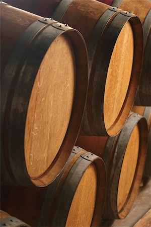 Wine casks lying down in order Stock Photo - Premium Royalty-Free, Code: 693-03304563