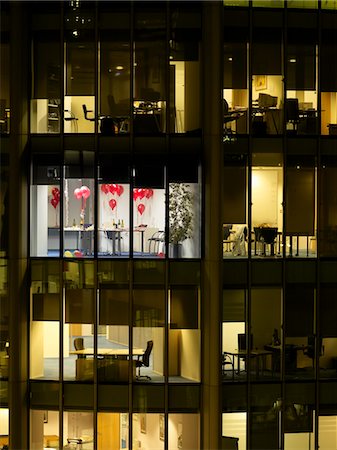 Empty office after party, view from building exterior, night Stock Photo - Premium Royalty-Free, Code: 693-03305988