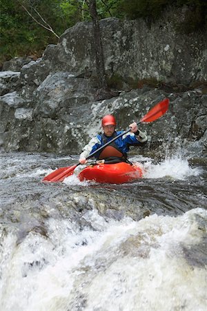 Man kayaking in river Foto de stock - Sin royalties Premium, Código: 693-03308483