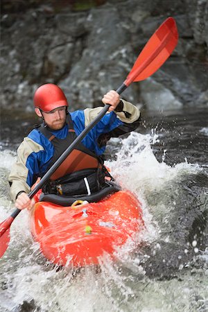 simsearch:400-04536316,k - Man kayaking in river Foto de stock - Sin royalties Premium, Código: 693-03308493