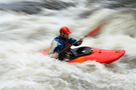 simsearch:400-04536316,k - Man kayaking in river Foto de stock - Sin royalties Premium, Código: 693-03308506