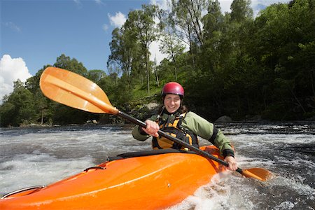 Woman kayaking in river, portrait Foto de stock - Sin royalties Premium, Código: 693-03308521