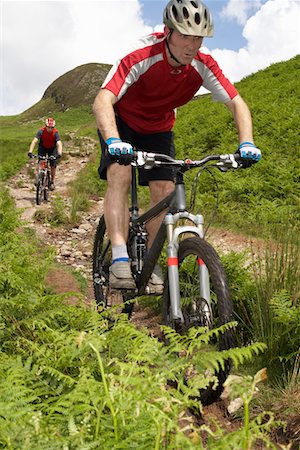 pictures of the cyclist track - Two cyclists on track in countryside Stock Photo - Premium Royalty-Free, Code: 693-03308570