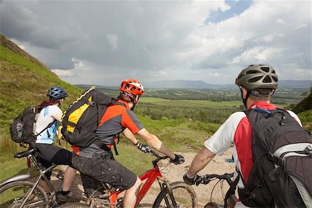 pictures of the cyclist track - Three cyclists on track in countryside Stock Photo - Premium Royalty-Free, Code: 693-03308585