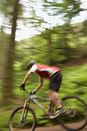 pictures of the cyclist track - Male cyclist on track in countryside Stock Photo - Premium Royalty-Free, Code: 693-03308596