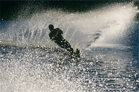 Water skier in action, silhouette Stock Photo - Premium Royalty-Free, Code: 693-03308682