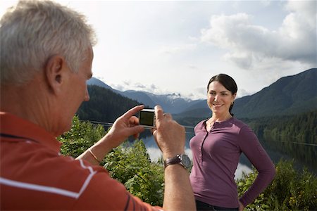 simsearch:693-03304775,k - Man photographing woman, mountains in background Stock Photo - Premium Royalty-Free, Code: 693-03309022