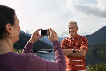 simsearch:693-03304775,k - Woman photographing man, mountains in background Stock Photo - Premium Royalty-Free, Code: 693-03309023