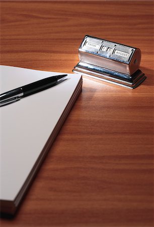 desk toy - Notepad, pen and old fashioned calendar in desk Stock Photo - Premium Royalty-Free, Code: 693-03309543