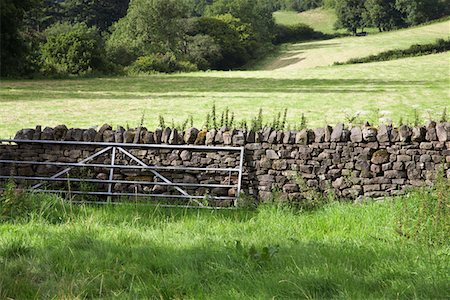 stone walls in meadows - Gate and stone wall between fields Stock Photo - Premium Royalty-Free, Code: 693-03309714