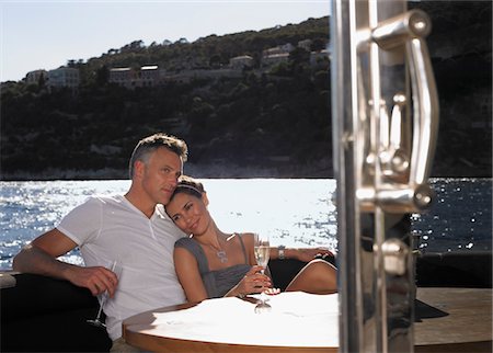 simsearch:693-06014384,k - Couple Drinking Champagne on Boat Stock Photo - Premium Royalty-Free, Code: 693-03309793