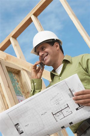 simsearch:693-06018719,k - Construction Worker Using Cell Phone Stock Photo - Premium Royalty-Free, Code: 693-03300015