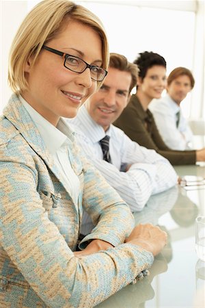 simsearch:693-03564532,k - Businesswoman in conference meeting, portrait Stock Photo - Premium Royalty-Free, Code: 693-03300282