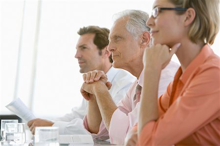 simsearch:693-03707355,k - Business colleagues in conference meeting Stock Photo - Premium Royalty-Free, Code: 693-03300335
