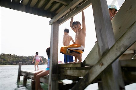 simsearch:693-03309308,k - Children playing on pier Stock Photo - Premium Royalty-Free, Code: 693-03300550