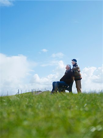 senior couple bench standing - Senior couple in park Stock Photo - Premium Royalty-Free, Code: 693-03300687