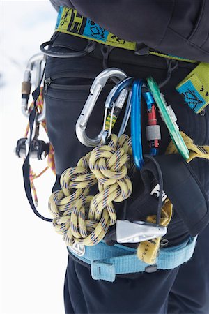 simsearch:693-03300957,k - Hiker's belt filled with safety ropes, mid section Foto de stock - Sin royalties Premium, Código: 693-03300938