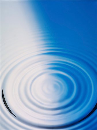 photography water ripples circles - Rippled water surface, close-up Stock Photo - Premium Royalty-Free, Code: 693-03301780