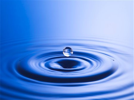 photography water ripples circles - Drop hitting surface of water, close-up Stock Photo - Premium Royalty-Free, Code: 693-03301804