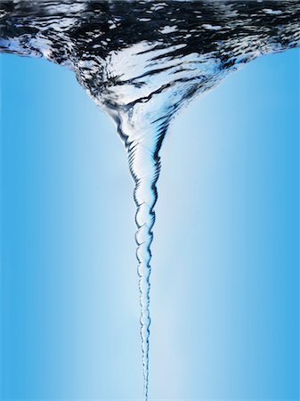 The water in the vortex turns faster and faster - a Royalty Free Stock  Photo from Photocase