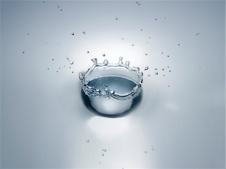 photography water ripples circles - Splash in water creating crown shape Stock Photo - Premium Royalty-Free, Code: 693-03301819