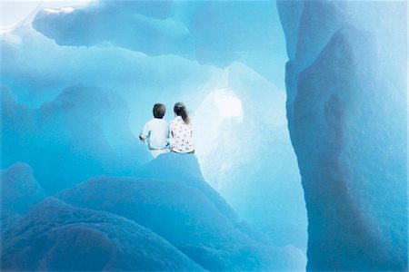 simsearch:693-03309308,k - Two children (6-8) in glacier, back view Stock Photo - Premium Royalty-Free, Code: 693-03301870