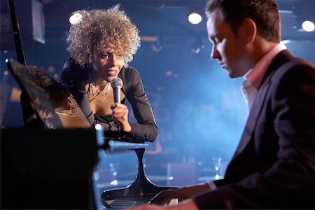 singer and stage - Jazz singer and pianist on stage Stock Photo - Premium Royalty-Free, Code: 693-03302108