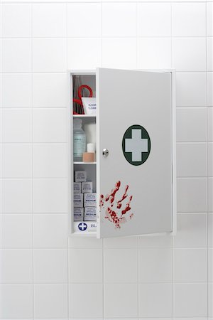 Blood hand print on medical cabinet Stock Photo - Premium Royalty-Free, Code: 693-03302259