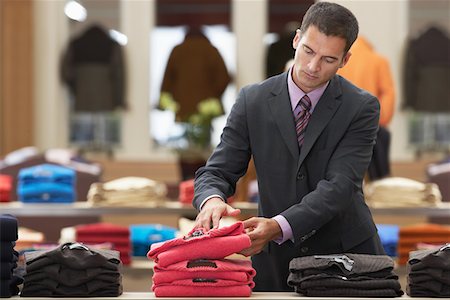 simsearch:693-03707603,k - Businessman shopping in clothes store Stock Photo - Premium Royalty-Free, Code: 693-03302392
