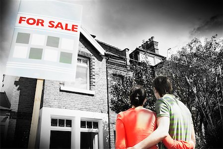 selling home - Couple in Front of New Home Stock Photo - Premium Royalty-Free, Code: 693-03302708