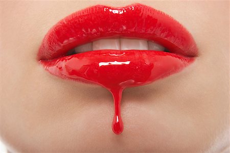 Lips Dripping Gloss Foto de stock - Royalty Free Premium, Número: 693-03302852