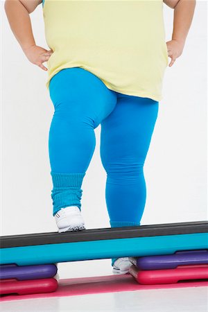 simsearch:693-03557462,k - Plus-Size Woman on Exercise Steps, low section Stock Photo - Premium Royalty-Free, Code: 693-03302954