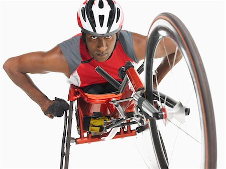 paraplegic males - Paraplegic cycler, low angle view Stock Photo - Premium Royalty-Free, Code: 693-03302966