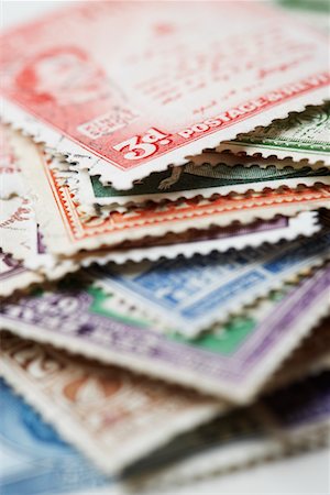 postage stamp - Pile of Postage Stamps Stock Photo - Premium Royalty-Free, Code: 693-03303014
