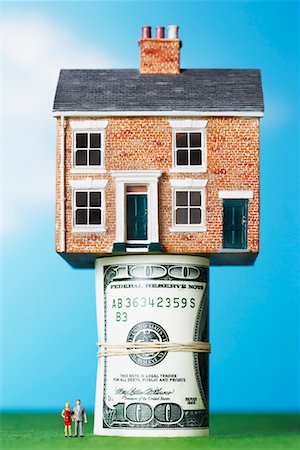 debt scales - Model house on roll of $100 notes Stock Photo - Premium Royalty-Free, Code: 693-03303012