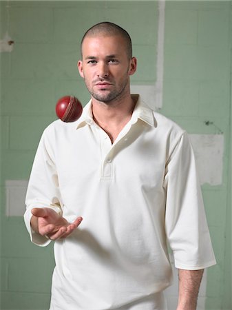 Confident Cricket Player Stock Photo - Premium Royalty-Free, Code: 693-03303347