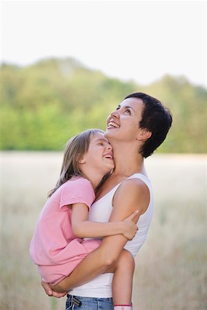 entre 3 y 4 años - Mother and Daughter Laughing Foto de stock - Sin royalties Premium, Código: 693-03314009