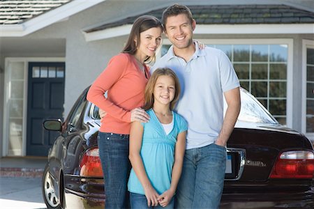 suburban family lifestyle - Family outside house with car Stock Photo - Premium Royalty-Free, Code: 693-03314063