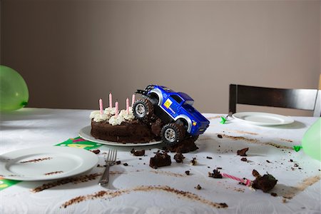 simsearch:693-03314657,k - Toy car driven into birthday cake Stock Photo - Premium Royalty-Free, Code: 693-03314654