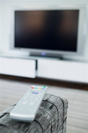 remote control tv - Remote control and television set Stock Photo - Premium Royalty-Free, Code: 693-03314959