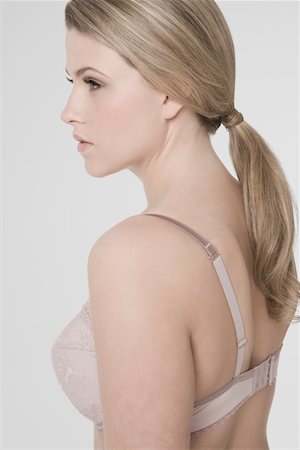 simsearch:693-03315174,k - Sexy young woman wearing bra, profile Stock Photo - Premium Royalty-Free, Code: 693-03315158