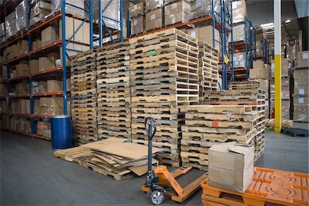 simsearch:693-03315346,k - Wooden pallets stacked in distribution warehouse Stock Photo - Premium Royalty-Free, Code: 693-03315327